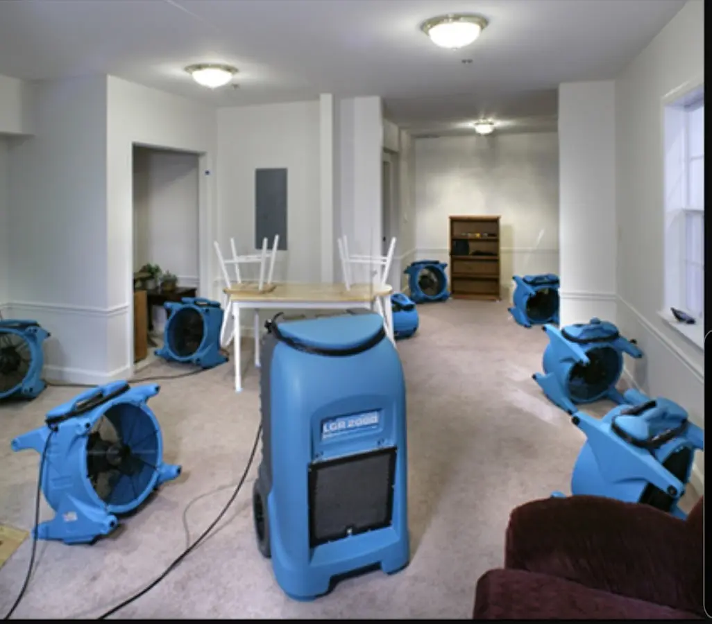 Air movers and dehumidifier setup for Water Damage Restoration in Lexington